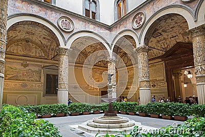 People walk inside Old Palace, Palazzo Vecchioâ€™s first Courtyard, town hall of Florence, Italy Editorial Stock Photo